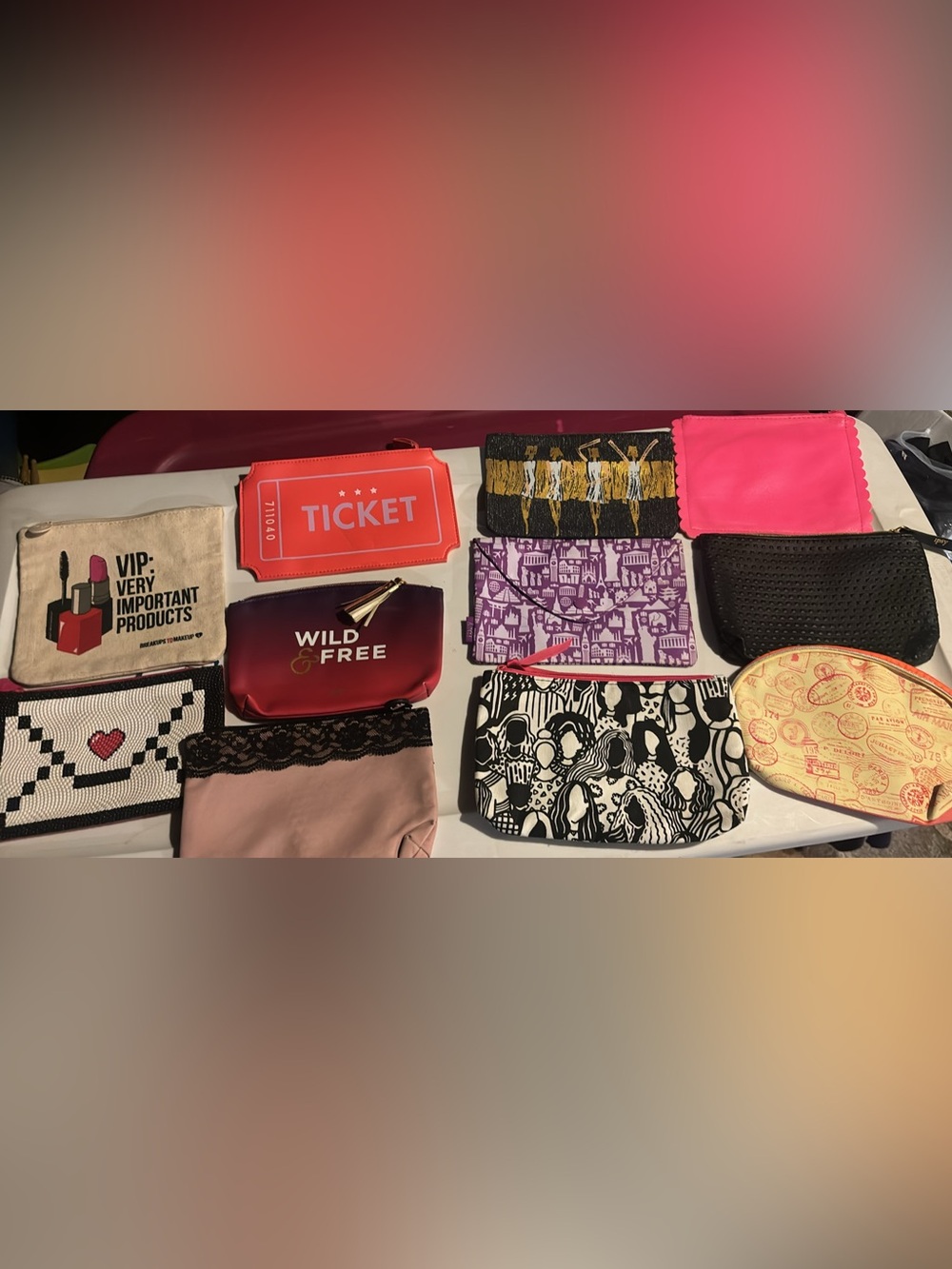 Eleven Assorted Pink and Multicolor Women’s Cosmetic Pouch Collection